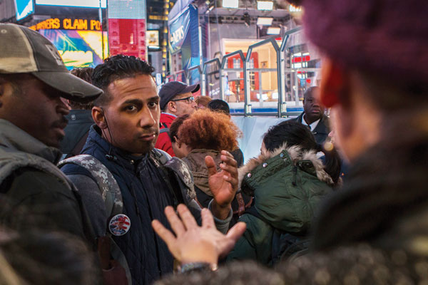 In Hell’s Kitchen, An Election Night Endurance Test 6 Harlem resident and Trump supporter Hugo Lantigua engages in a heated discussion with a Hillary Clinton supporter on Tuesday night before the outcome of the election was clear. Photo by Zach Williams.