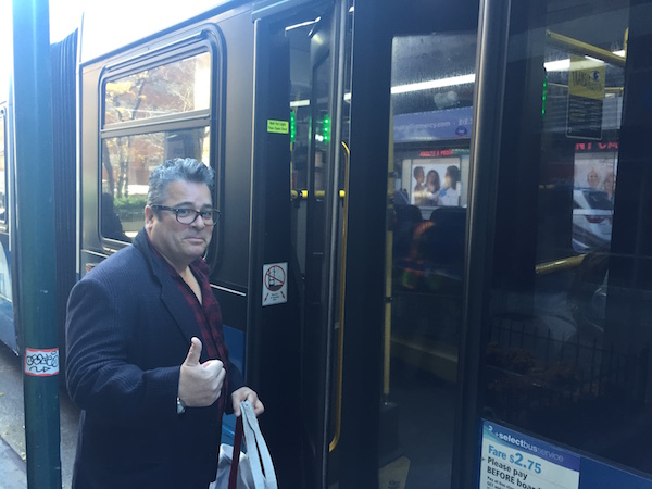 Upgraded M23 Bus Still Riding A Learning Curve 2 Regular M23 rider Carlos D. was confident the new system would work out for the better. Photo by Dennis Lynch.
