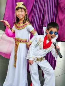 Halloween on the Hudson: Brookfield Place hosts costumed carnival at Winter Garden 2 Photo by Milo Hess Pop stars ancient and modern were well represented at the Brookfield bash — from 8-year-old Charlize Hsieh's elegant Cleopatra, to her 6-year-old brother Cayden's rockin' Elvis.