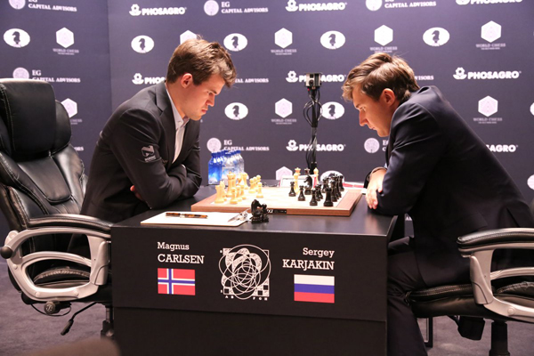Grandmaster splash: World chess championship dazzles at Seaport’s Fulton Market Building 1 Rob Kim / Getty Images for Agon Limited Reigning World Chess Champion Magnus Carlsen and Chess grandmaster Sergey Karjakin contemplate their moves in the opening game of the 2016 World Chess Championship running from Nov. 11–30 at the newly renovated Fulton Market Building at the Seaport.