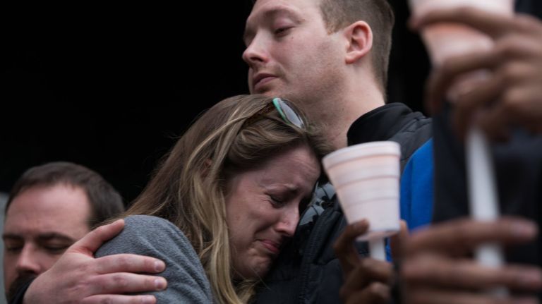 A vigil was held for slain NYPD Sgt. Paul Tuozzolo outside the Paramount in Huntington, Saturday, Nov. 5, 2016.