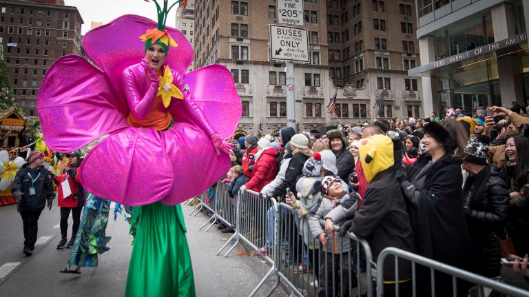 A dancing flower performs at Sixth Avenue and 59th Street on Thursday, November 24, 2016, during the 90th annual Macy's Thanksgiving Day Parade in Manhattan.