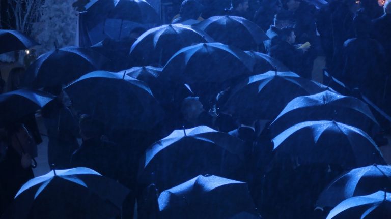 Umbrellas protect the VIPs at the Rockefeller Center tree lighting on Wednesday, Nov. 30, 2016