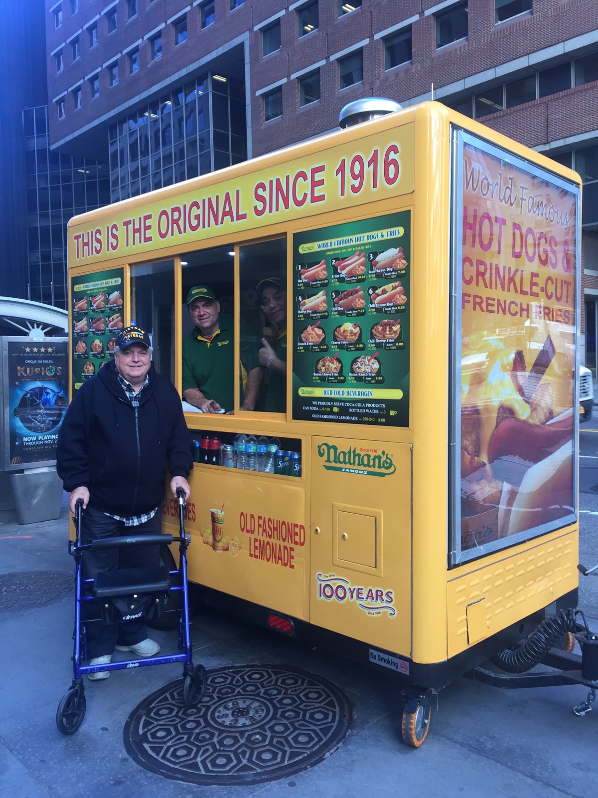 Disabled veteran Chris Mustello standing in front of his MOVE Systems cart in Tribeca. Photo courtesy Chris Mustello 