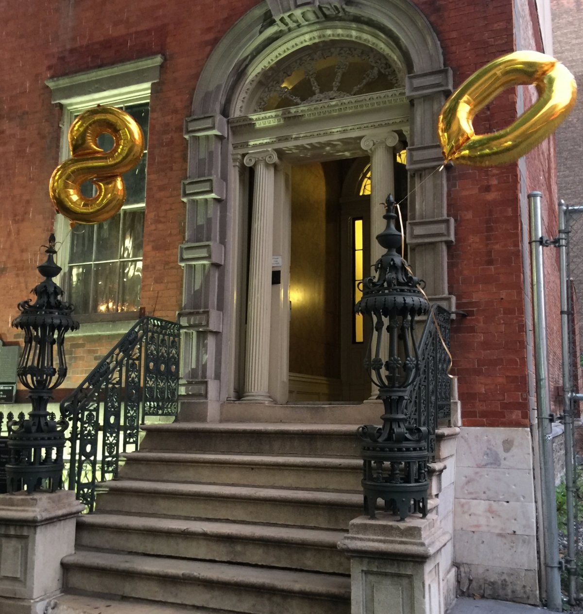 The stoop of the Merchant’s House Museum on E. Fourth St. was decked out with balloons for its recent 80th anniversary event. Photo courtesy Merchant's House