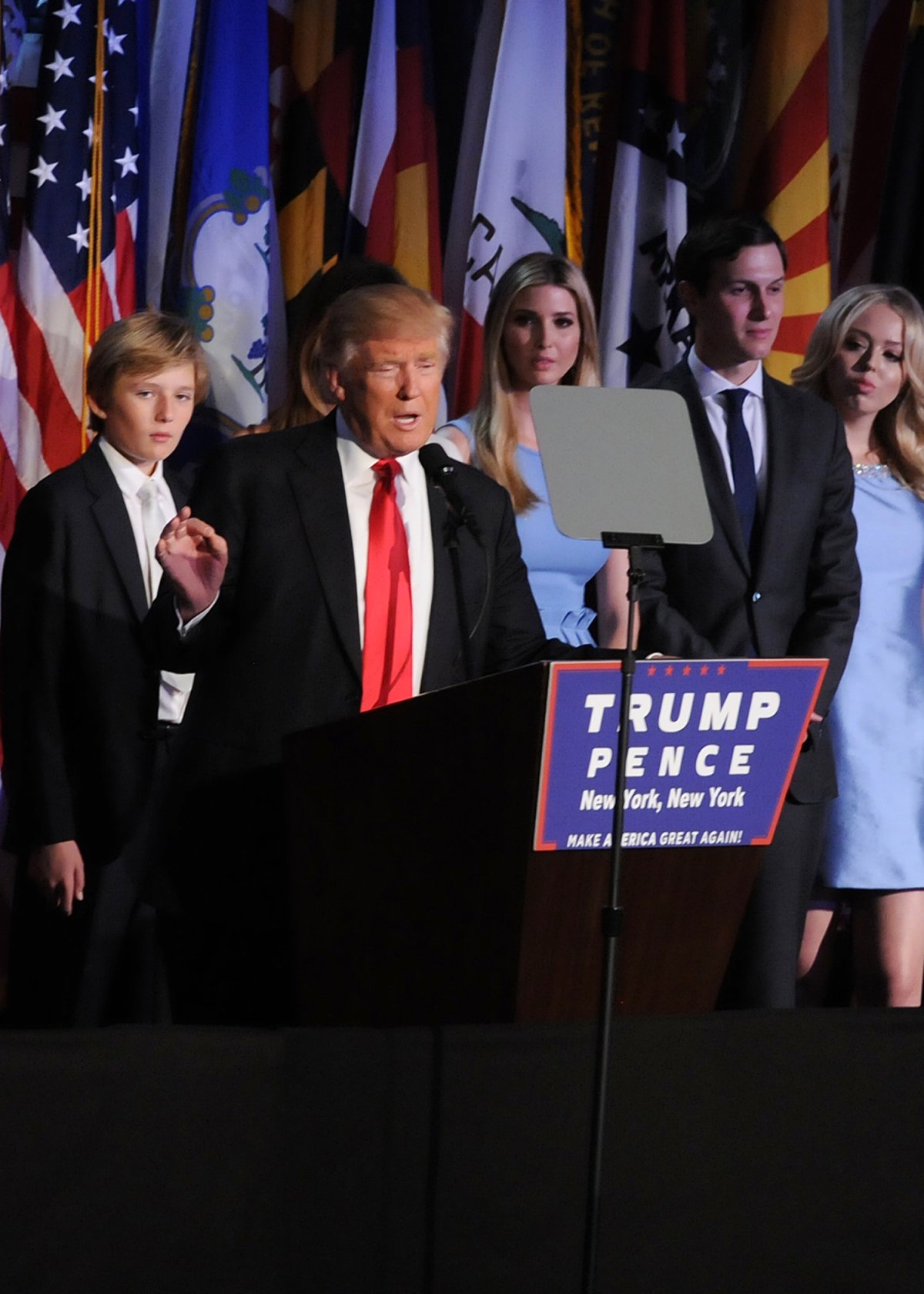 Donald Trump giving his victory speech early Wednesday morning at the New York Hilton hotel in Midtown, with, from left, his youngest son, Barron, his daughter Ivanka, her husband Jared Kushner — publisher of the Observer and a real estate owner in the East Village and Soho — and Melody, Trump's lesser-known daughter. Kushner has been accused of harassment by some tenants in his East Village buildings where renovations were being done.