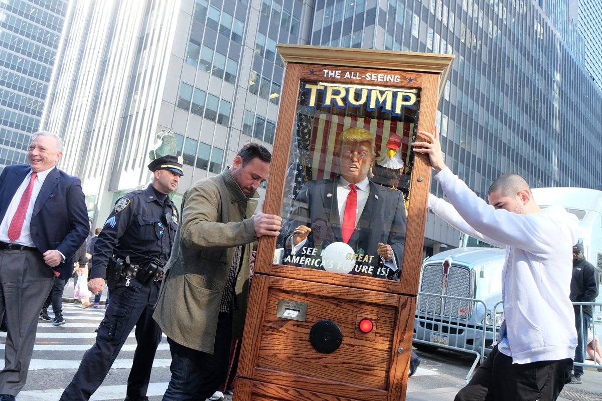 A few hours before the polls closed, two men moved the All-Seeing Trump fortune-telling machine — which proved to be accurate — into position near the New York Hilton, where Trump would later celebrate his shocking win. Photo by John Alpeyrie