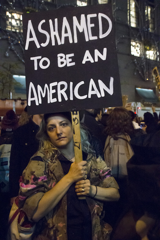 ‘Not my president!’ Protesters take it to Trump Tower 2 A protester showed her disgust with The Donald. Photos by Cody Brooks