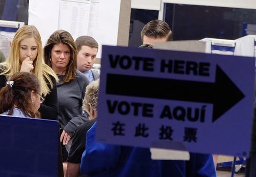 Lower Manhattan residents being checked in by election workers at a Southbridge Towers poll site during this past April’s 65th Assembly District special election. Villager file photo