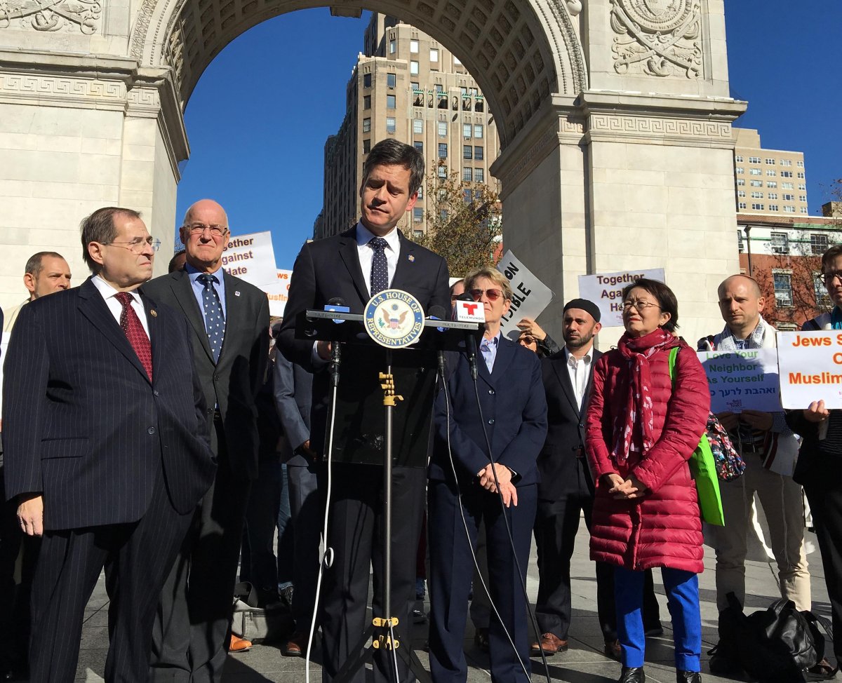 State Senator Brad Hoylman, center, led a press conference with fellow local politicians, faith leaders and university presidents last Thursday to decry the recent spate of hateful graffiti and messages around the West Village and on two of its university campuses. Hoylman and his family have been viciously targeted on Twitter by right-wingers, an elevator in his building was defaced with swastikas and, three days after the park press conference, he received a packet of anti-Semitic hate mail.