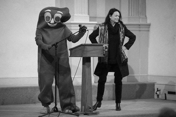 We Need a Little New Year’s NOW 2 Jim Behrle, in Gumby costume, with Poetry Project Marathon Reading founder Anne Waldman. Photo by Ted Roeder.