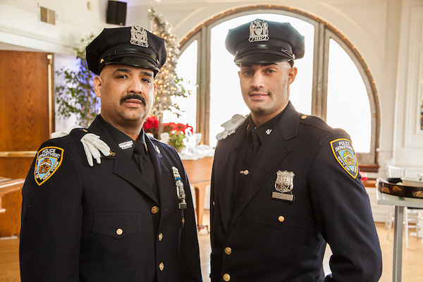 Lucky For Us: 13th ‘Safe City’ Ceremony Honors NYPD Officers 4 L to R: Police Officer Alberto Ortiz, of Midtown South, and his son, Police Officer Justin Ortiz, of the 46th Precinct. Photo by Leigh Beckett.