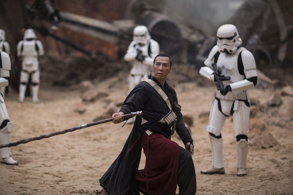 Donnie Yen does battle against stormtroopers as Chirrut Îmwe in “Rogue One: A Star Wars Story.” Photo via Disney.