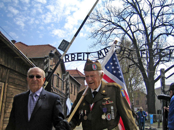 At 2012’s March of the Living, Rick Carrier, right, meets Holocaust survivor Irving Roth, who was among those liberated when Carrier entered Buchenwald concentration camp alongside Patton’s Third Army. Photo by Lynn Ramsey.