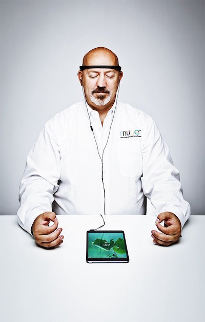 Gizmos and games as gifts for geeks 5 A man demonstrates how to meditate using the Muse headband and associated app. Image via choosemuse.com.