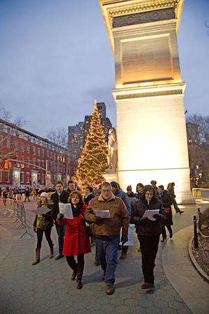 Here you go a-caroling: Dec. 17, with the help of the West Village Chorale. Photo by Suzanne Blakely.