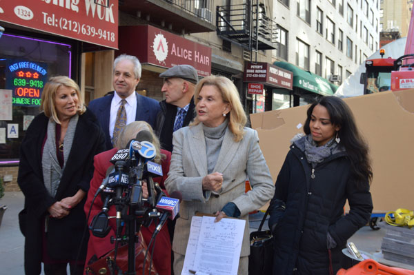 Dottie Herman, CEO of Douglas Elliman Real Estate, Dave Goodside, owner of Beach Cafe (obscured), Trudy Mason, a member of New York City Transit Riders Council, Sammy Musovic, president of the Second Avenue Merchants Association, and Congressmember Carolyn Maloney at a December 20 press conference discussing the benefits of the new Second Avenue Subway line due to be open for business on New Year's Day. | JACKSON CHEN 