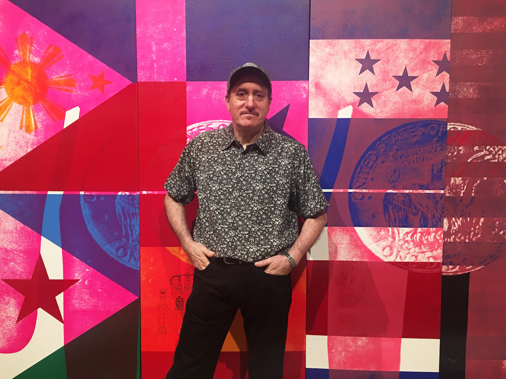 Ramones tour manager Monte Melnick, in front of Alan Vega's masterpiece, "Empire," shared stories from life on the the road with Vega and the famed punk band.