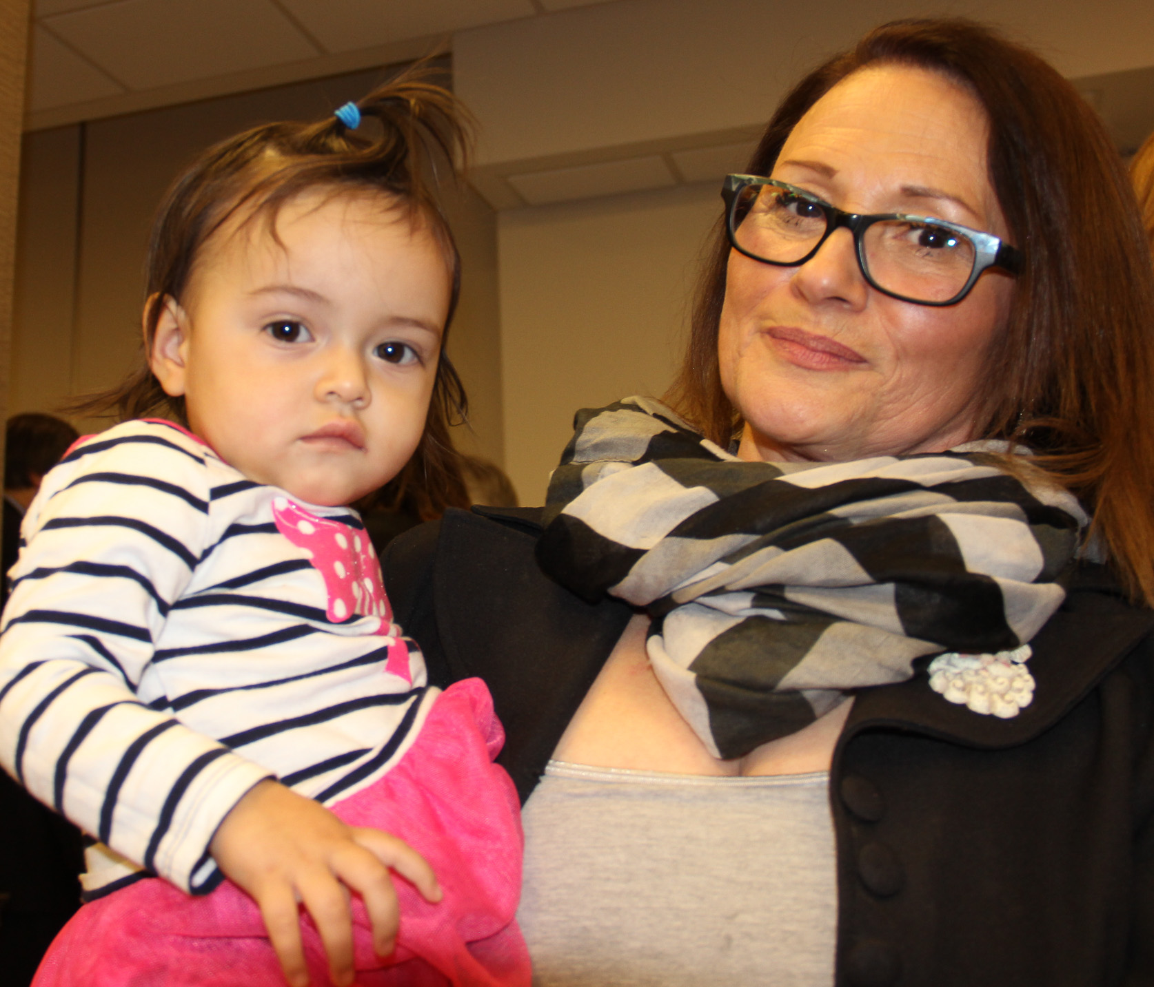 District Leader Alice Cancel with her granddaughter Olivia at Wednesday night’s Three Kings party at Southbridge Towers.   Photo by Tequila Minsky