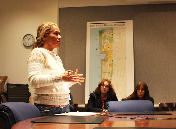 Photo by Bill Egbert The first member of the public ever allowed to comment at a BPCA board meeting, a Cove Club resident who identified herself as “Jeanette,” got into an argument with chairman Dennis Mehiel over the strict two-minute time limit. Seated are the other two residents who spoke at the Dec. 7 meeting, Tammy Meltzer, at right, and Justine Cucca.