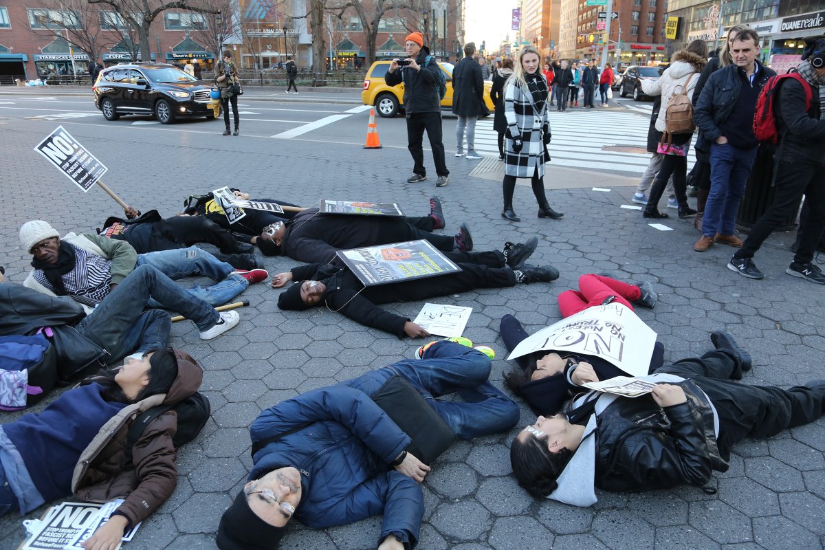Anti-Trump protesters held a die-in in Union Square Sunday after his tweets about starting a nuclear arms race. Photo by Jefferson Siegel
