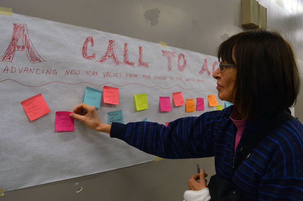 Defending New York Values Against New Yorker-in-Chief 1 A post-it wall for suggestions in the lobby area outside of where CIty Councilmember Dan Garodnick held a community forum on defending New York values. | JACKSON CHEN