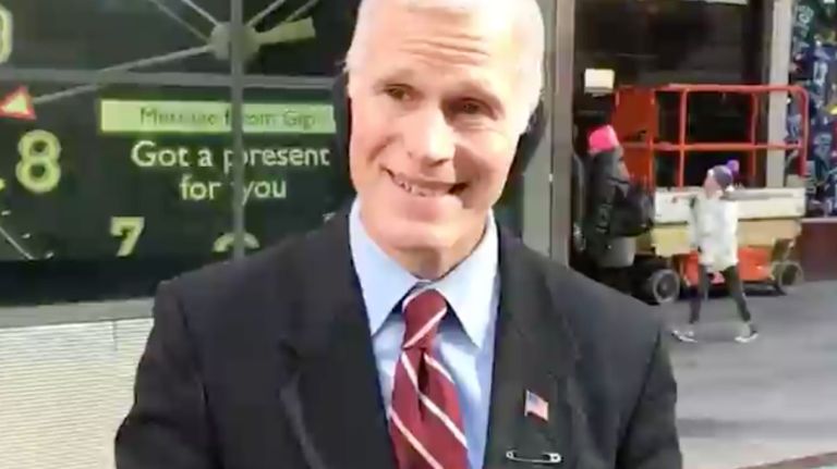 Mike Pence lookalike fundraises for charity in Times Square