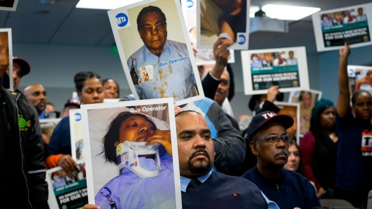 MTA union workers threaten strike if contract demands aren’t met 2 MTA union members are demanding safety improvements and better pay in their contract requests. Above, members of TWU Local 100 hold pictures of fellow transit workers who were assaulted and injured on the job at an MTA board meeting on Dec. 14, 2016.