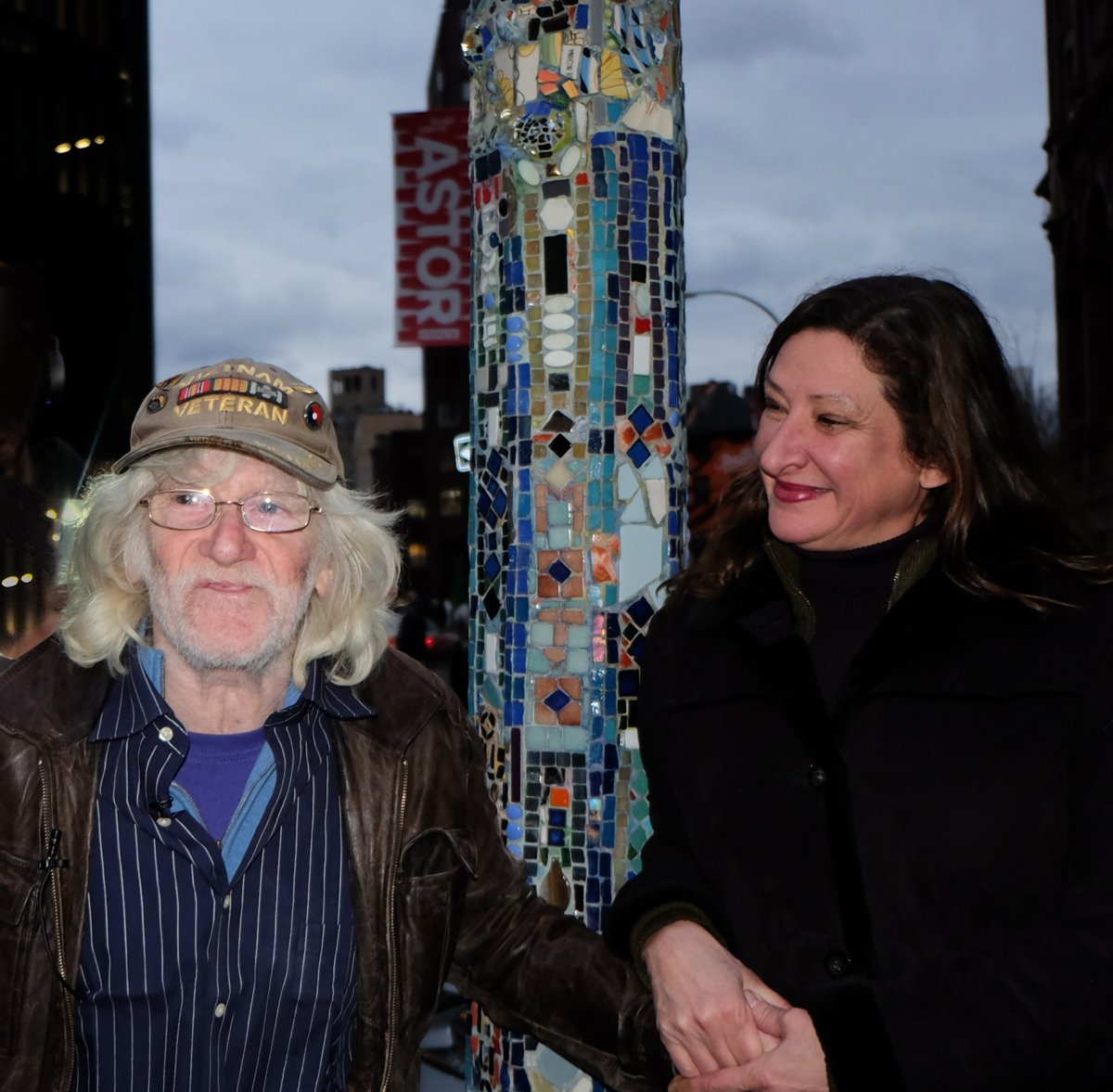 What a team! Jim Power and Julie Powell in front of one of Power’s restored lampposts on Astor Place at the unveiling ceremony earlier this month. Power said Powell, the daughter of a Marine, used tough love to keep him going during rough patches. Powell said she had long admired Power’s lampposts and always wanted to work with him. Photo by Tequila Minsky