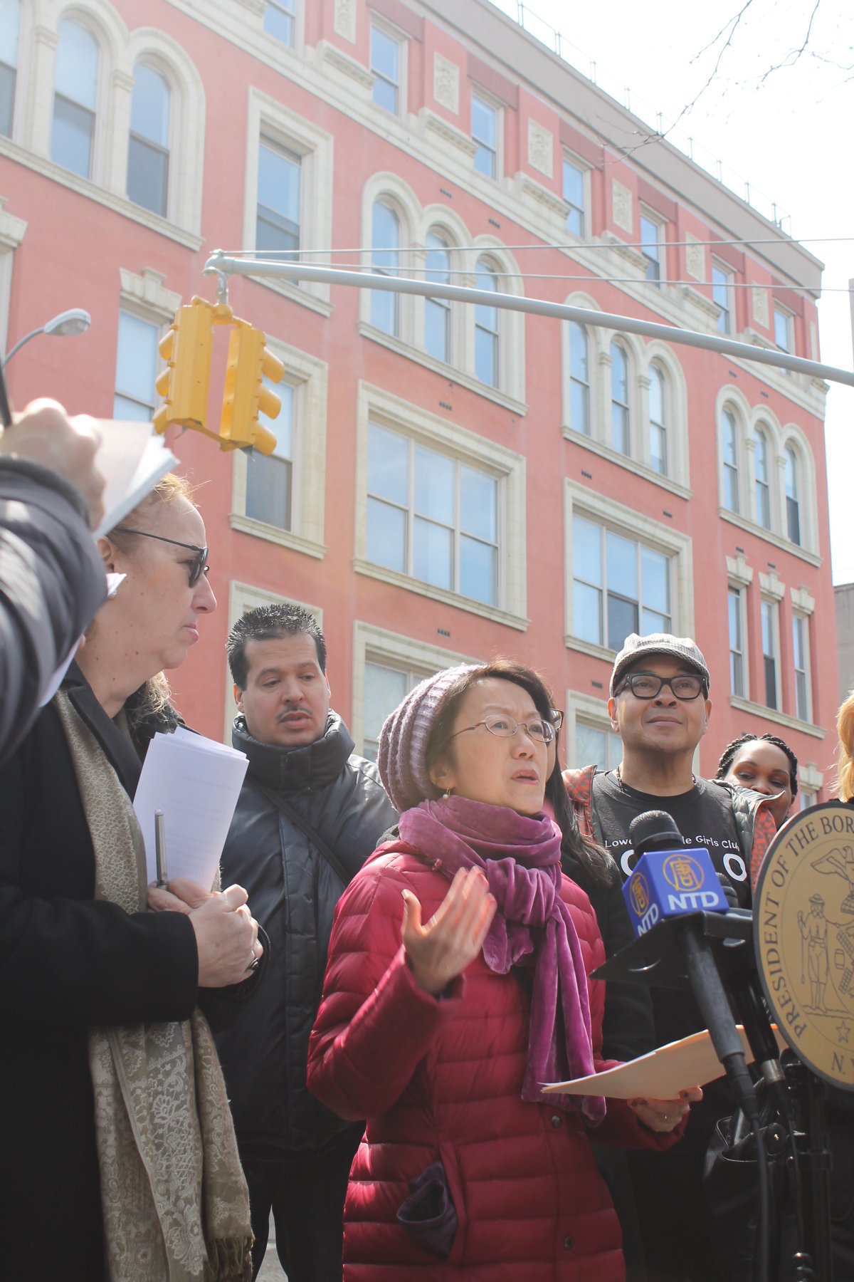 At a protest in early April outside Rivington House, City Councilmember Margaret Chin, speaking above, joined Manhattan Borough President Gale Brewer, state Senator Daniel Squadron and other local elected leaders and community members in condemning the property’s stealth sale to a luxury residential developer. The shady deal — which involved the quiet lifting of deed restrictions — had been exposed two weeks earlier. Villager file photo