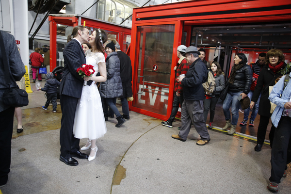 High Over East River, Among Strangers, Couple Make Vows 2 The married couple, after departing the tram. | JENNY MACFARLANE/ STYLISHHIPWEDDING S.COM