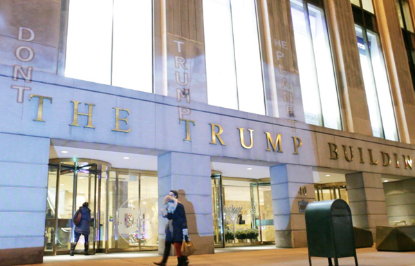 The Sierra Club / The Illuminator Climate-change activists set up a projector outside the Trump Building earlier this month to show rising waters flooding the 40 Wall St. property.