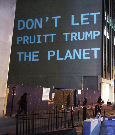 The Sierra Club / The Illuminator The Dec. 13 demonstration by the Sierra Club and NYC-based activist The Illuminator was in response to Trump’s naming Oklahoma Attorney General and outspoken climate-change denier Scott Pruitt to head the Environmental Protection Agency.