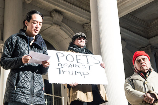 L to R: Maria de Los Angeles read “Who Am I?” as poets Alan Kaufman and Tom Savage looked on. Photo by Alice Espinosa-Cincotta.