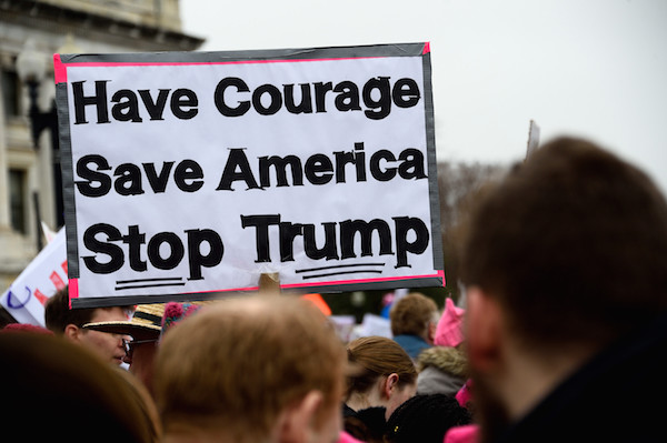 Women Marched on Washington, with the World in Lock Step 9 Of the thousands of signs seen at the March, this one offered a simple three-point plan. Photo by Donna Aceto.
