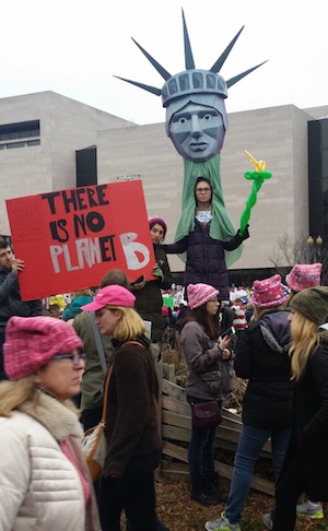 Women Marched on Washington, with the World in Lock Step 6 Creative messages included Lady Liberty warning that there is nowhere else to go — so let’s get to work. Photo by Ellen Black.