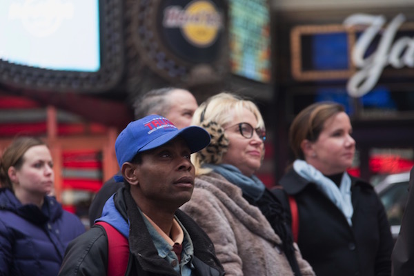 A supporter listened as President Trump delivered a message to the world: “From this day forward, it’s going to be only America first, America first.” Photo by Caleb Caldwell.