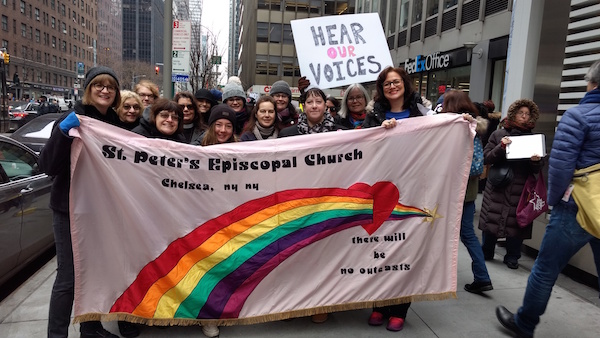 Throngs Take Prez to Task on His Hometown Turf 2 A contingent from St. Peter’s Chelsea Episcopal Church waited at Third. Ave. at E. 47th St. to step into the march. Photo courtesy St. Peter’s Chelsea.