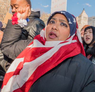 Photo by Milo Hess The Stars-and-Stripes hijab is fast becoming the fashion statement of the season at protests of Trump's Muslim ban.