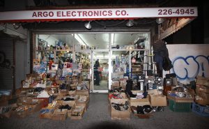 Photo by Tequila Minsky Argo Electronics, a legendary Canal St. purveyor of electrical odd and ends, boasts so may eclectic offerings that they literally spill out onto the sidewalk.