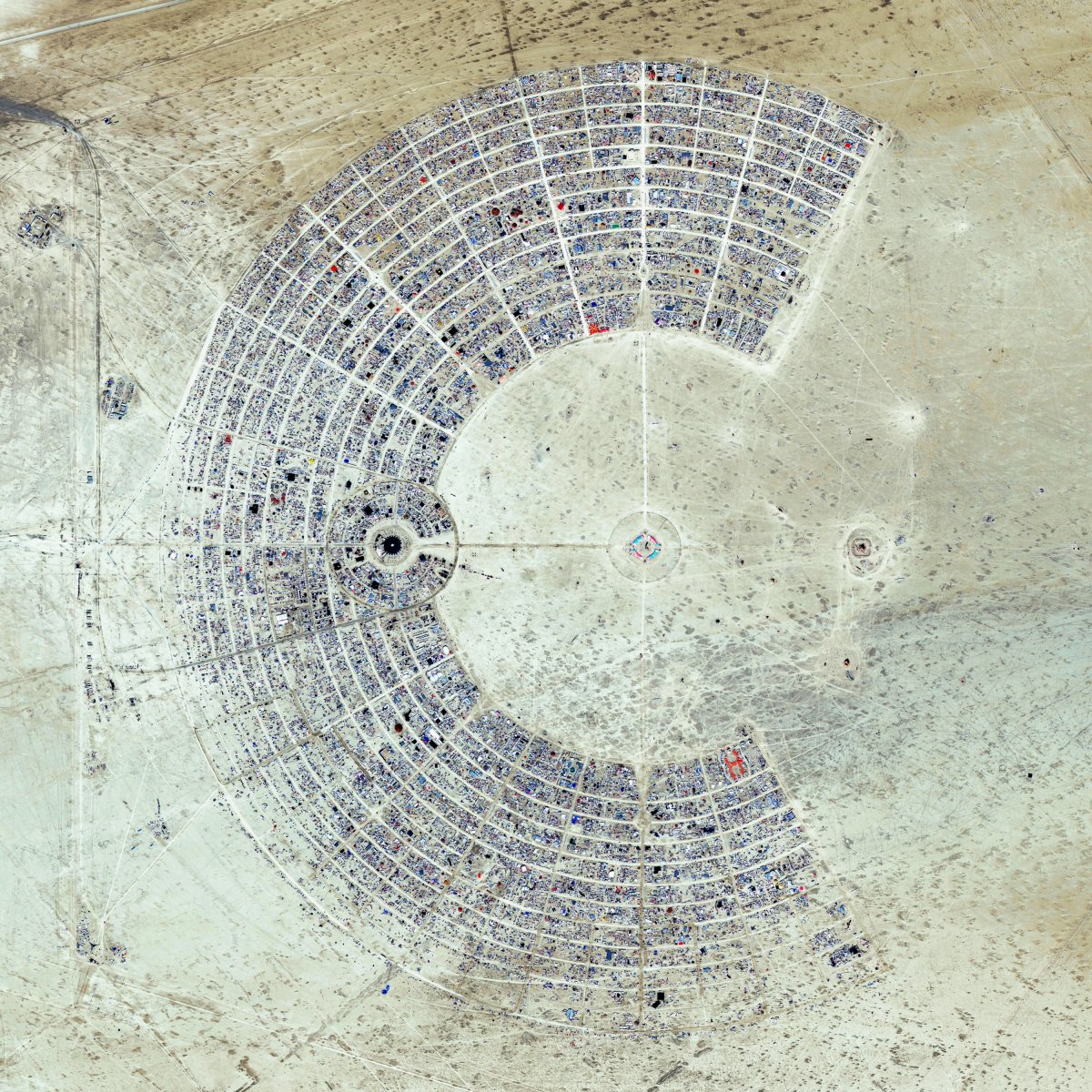 An aerial shot of Burning Man. The weeklong, annual event in Nevada's Black Rock Desert draws more than 65,000 participants, and is described as an experiment in community, art, self-expression and radical self-reliance.