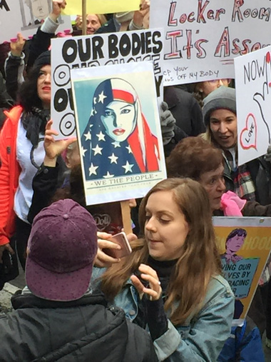 Marchers voiced support for immigrants, refugees, and ethnic and religious minorities. | MANHATTAN EXPRESS