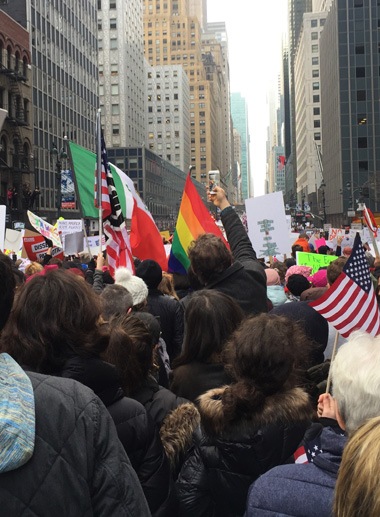 Throngs in Manhattan Offer Raspberries to Hometown Prez 5 Marchers carried American Flags, Mexican Flags, and Rainbow Flags. | MANHATTAN EXPRESS