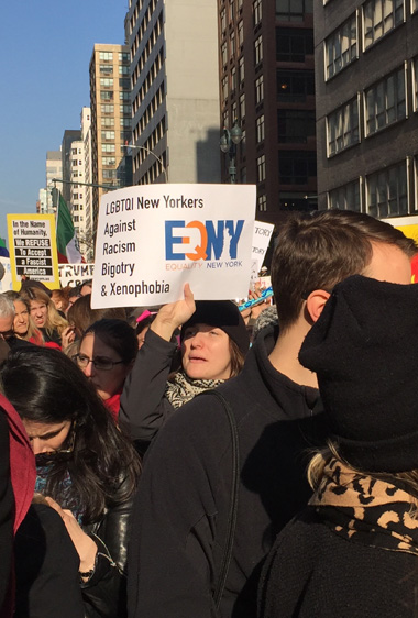 Joanna Leff carries a sign for Equality NY. | MANHATTAN EXPRESS