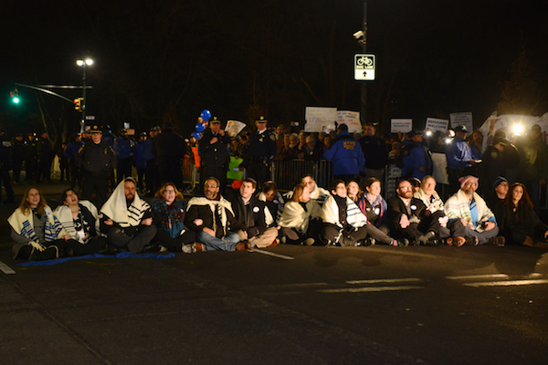 Judge, Rabbis Joined in Resistance to Trump Immigration Order 2 Nineteen rabbis affiliated with the Jewish social justice group T’ruah staged a sit-in on Central Park West outside the Trump International Hotel on February 6. Later, the group tweeted, “This is what Judaism looks like. | GILI GETZ
