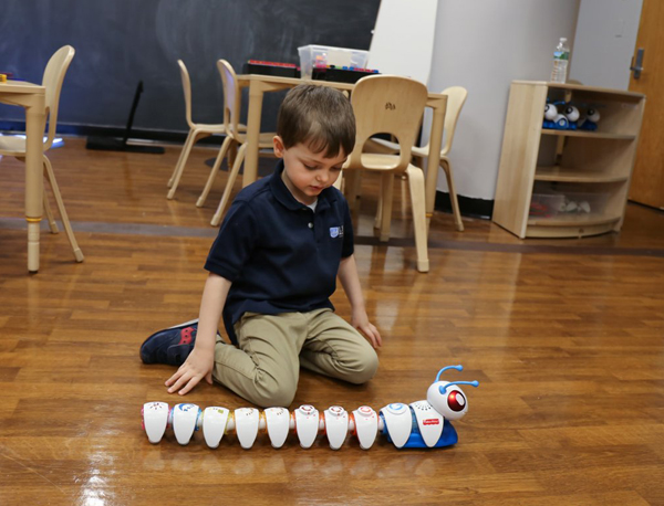 Photos by Tequila Minsky Code-A-Pillar is a caterpillar-shaped robot made up of interchangeable segments, each of which adds a different movement command to the overall contraption, allowing kids to program its behavior. 