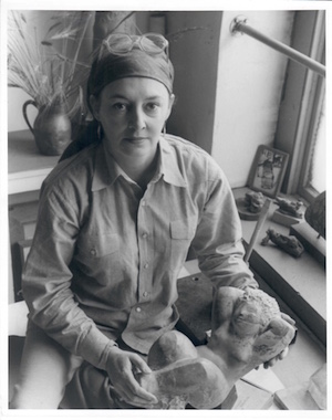 Lorrie Goulet puts her spirit in the stone 1 From 1963, Lorrie Goulet at her former studio on W. 21st St., holding an unfinished piece done in alabaster. Photo by Budd Photography.