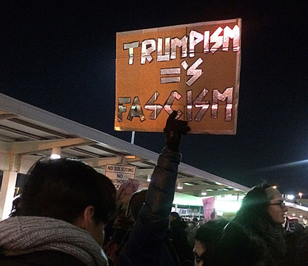Trump's Travel Ban Challenged in Courts, Airports, Streets, Squares 3 Many protesters view Trump’s immigration policy to be fascism. Photo by Naeisha Rose.