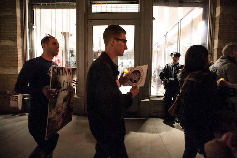 FEBRUARY 18, 2017-NEW YORK, NY-USA: A group of protestors hold a candle light vigil outside of the Canada Goose store in Manhattan on Saturday night. They are protesting inhumane treatment of animals and the Canada Goose coats. (Rebecca White for The Villager)