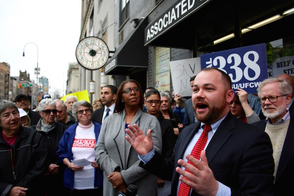Faced with a rent increase from $32,000 a month to more than $100,000, Associated Supermarket closed its doors after 27 years on W. 14 St. and Eighth Ave. This March 2016 rally drew dozens of loyal customers as well as Councilmember Corey Johnson (in tie), with State Assemblymember Richard Gottfried (at right) and Public Advocate Letitia James (at left). Chelsea Now file photo by Yannic Rack. 